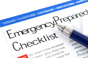Fountain pen lying on Emergency Preparedness Tips Checklist